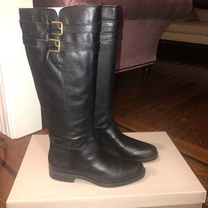 Black boots with buckle detail